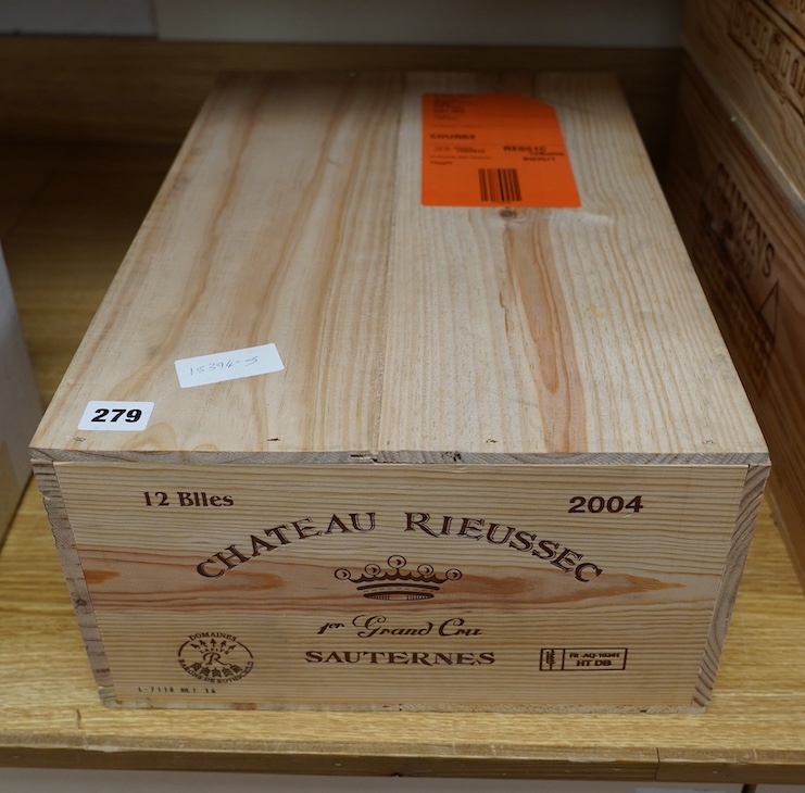 A sealed case of twelve bottles of 2004 Chateau Rieussec, Sauternes, in OWC, purchased en primeur from The Wine Society. Condition - good